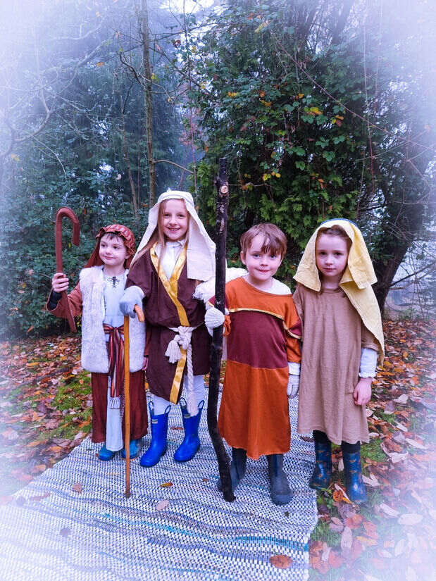 Young children dressed as shepherds in a College production
